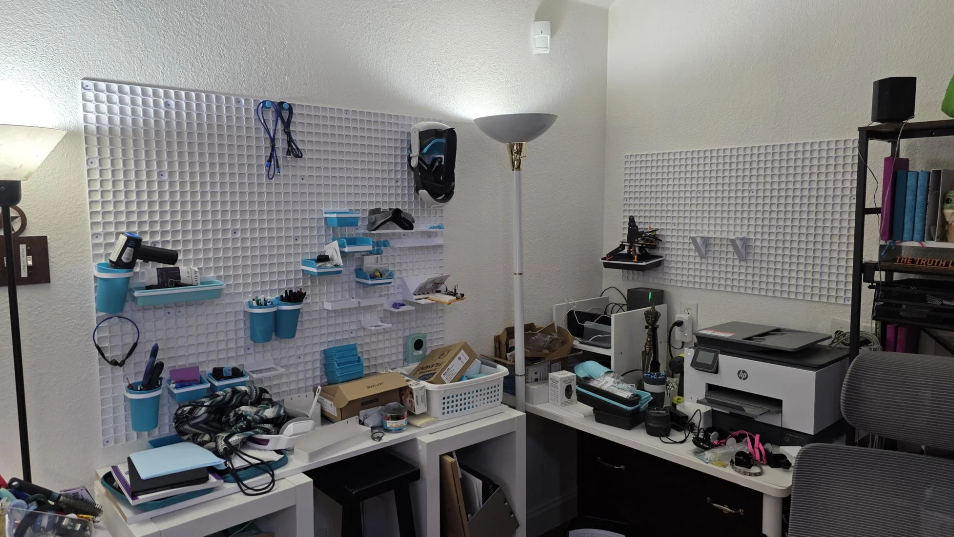 openGrid white waffle recessed-square wall grid with blue and white modular bins and hooks